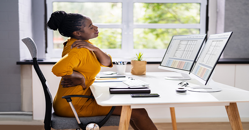 Lady sitting with bad posture