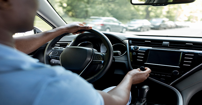 Man driving a car