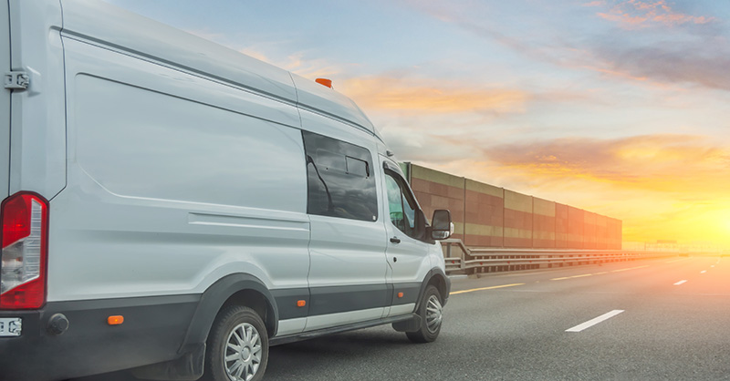 Passenger Van on Highway