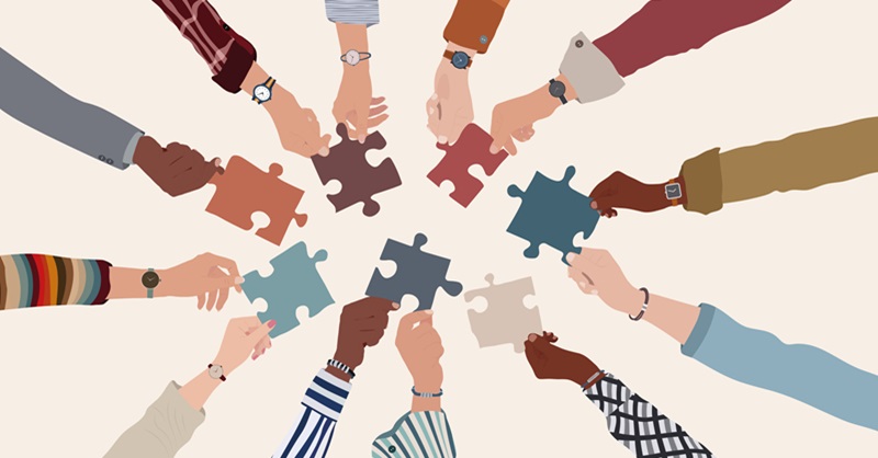 Illustration of hands holding puzzle pieces together